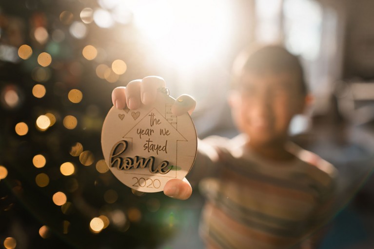 Boy holds an ornament 
