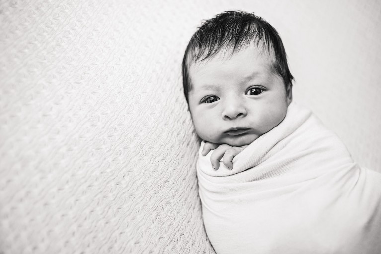 How to pose newborns for photos