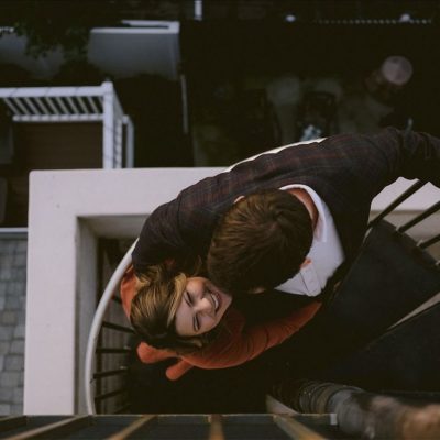 Alison Conklin image of couple on balcony from above