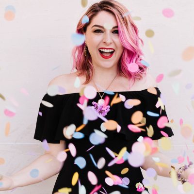 woman throwing confetti