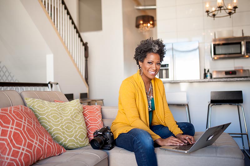 Danielle-Finney-lifestyle-business-portraits-10 Lifestyle business photo of woman at home on computer