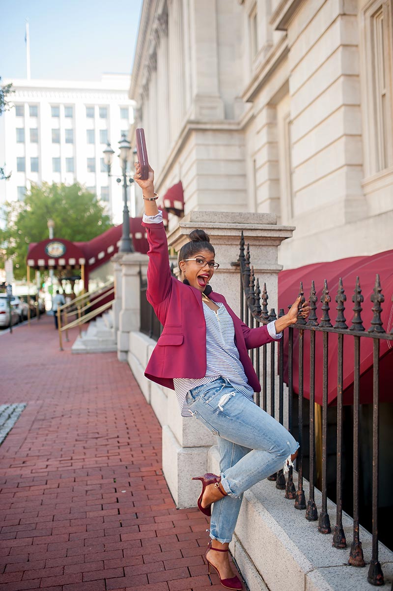 Danielle-Finney-lifestyle-business-portraits-4 Lifestyle business portrait of happy woman with fist in air