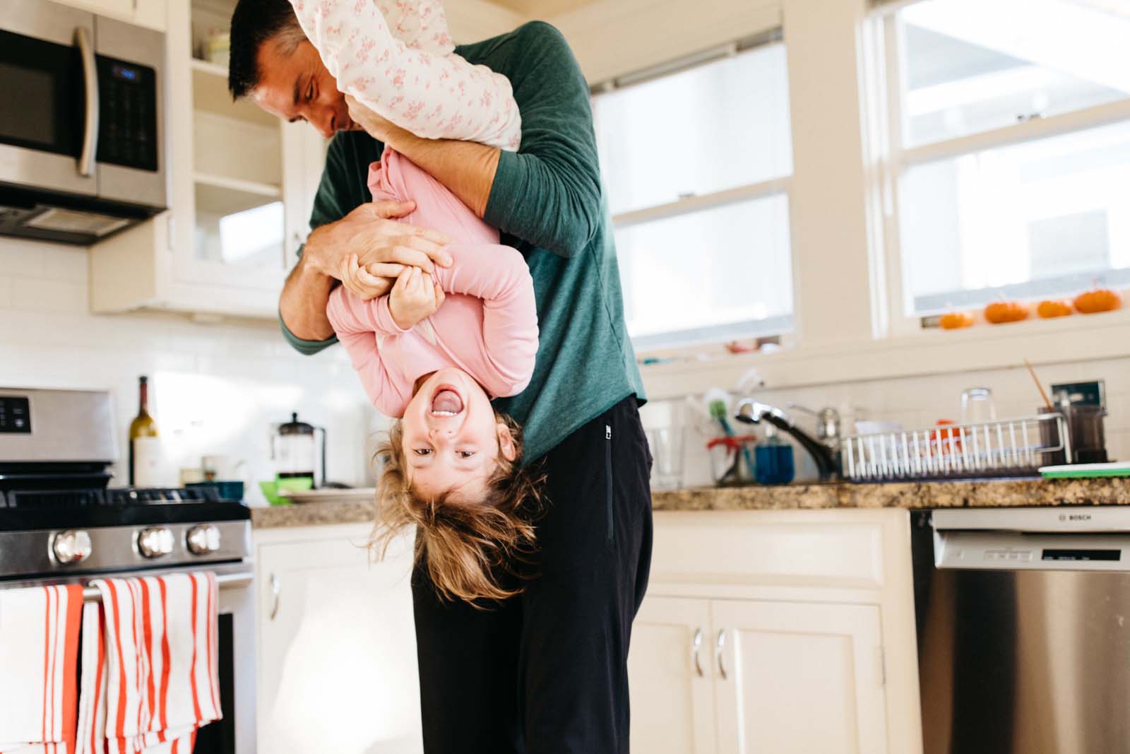 day-in-the-life-session-photography-10 Dad and daughter in the kitchen during day in the life session of photography