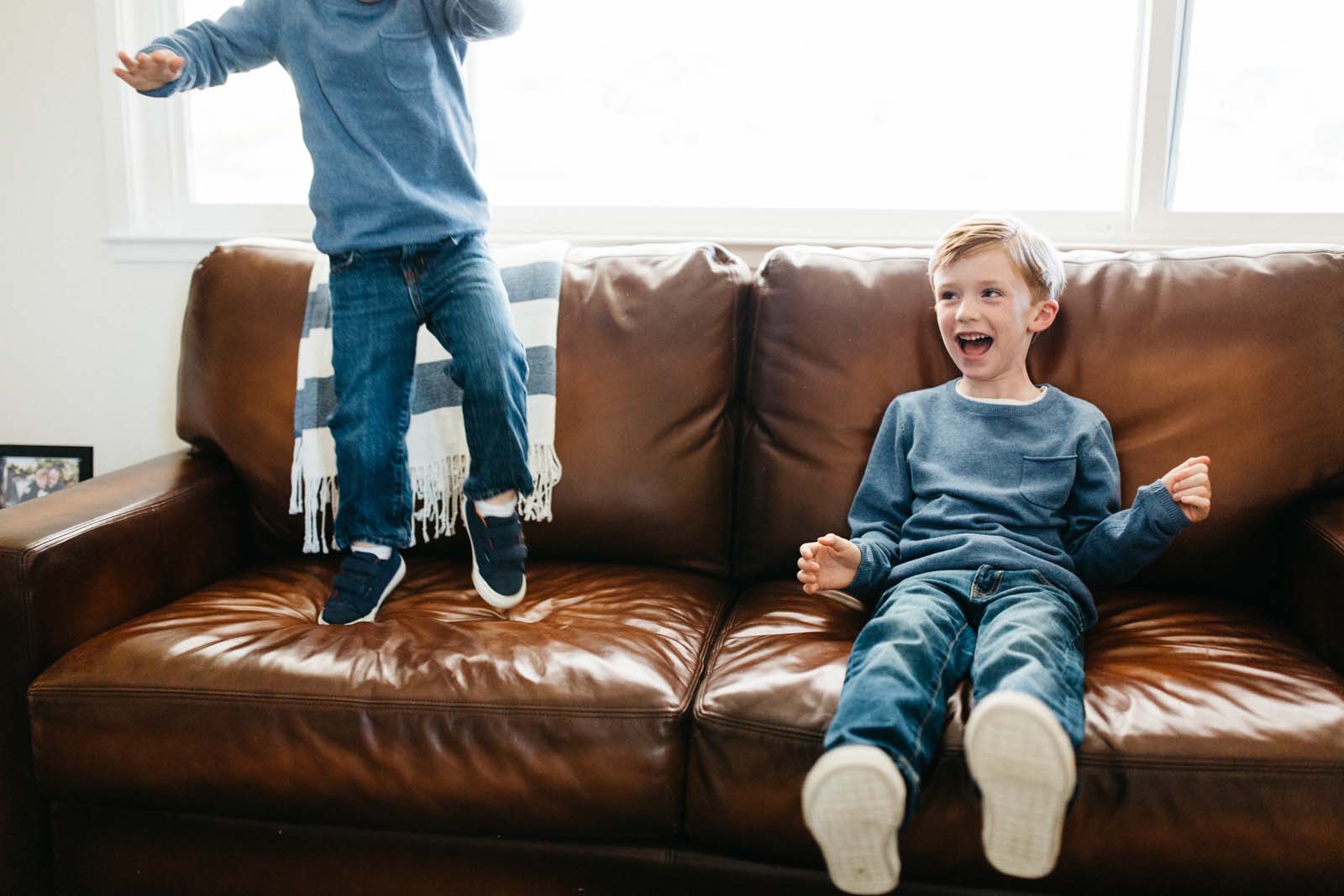 Boys on a sofa during a day in the life photo session
