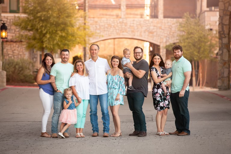 An extended family photo of a large group