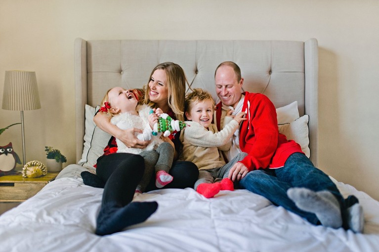family holiday pic on bed by Erica Williams