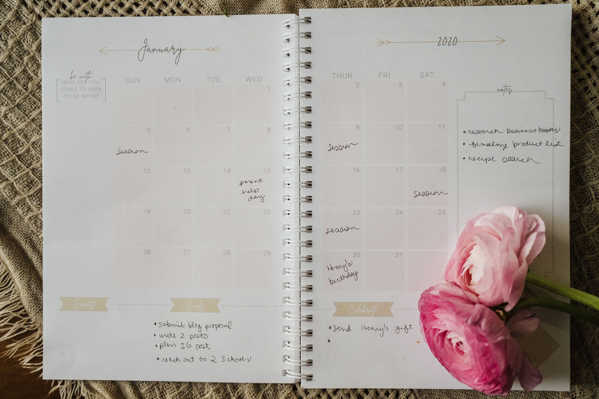Goal Setting-1-2 planner open to photography goals and action steps