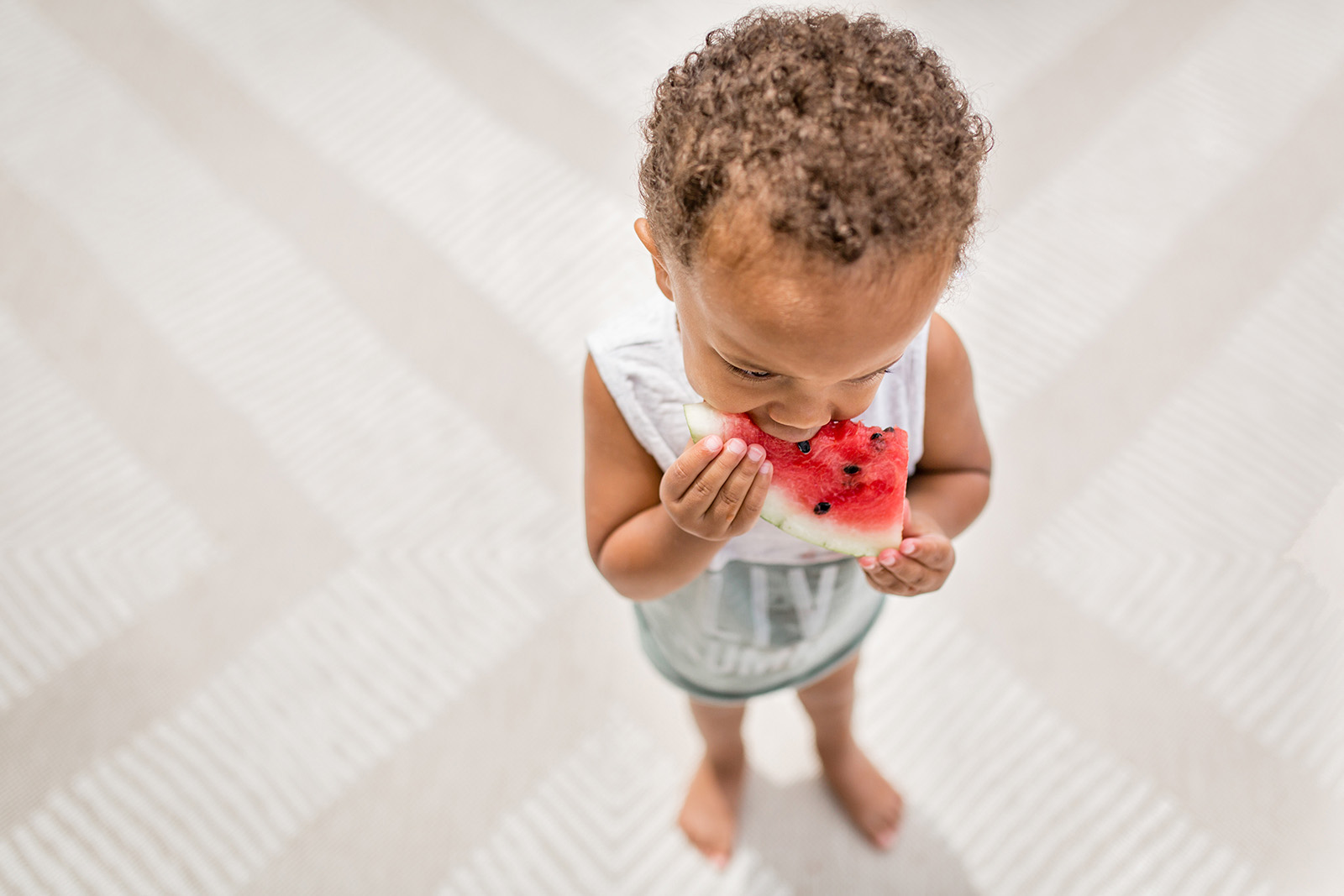 kid eating watermelon by Amanda Eskridge The summer months offer up countless opportunities to infuse your lifestyle sessions — with clients or your own brood — with color, whimsy and pure joy. To help you plow this rich loam, we’re planting a few ideas, from the sublimely simple to the ridiculously complex. (Bonus: These’ll keep the kids occupied for a minute, too.)