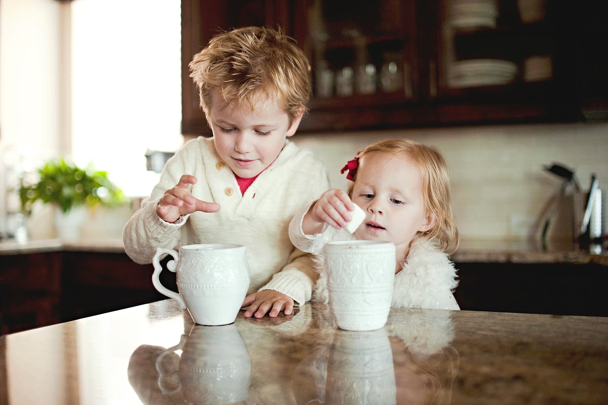 kids having marshmallows and hot chocolate by Erica Williams