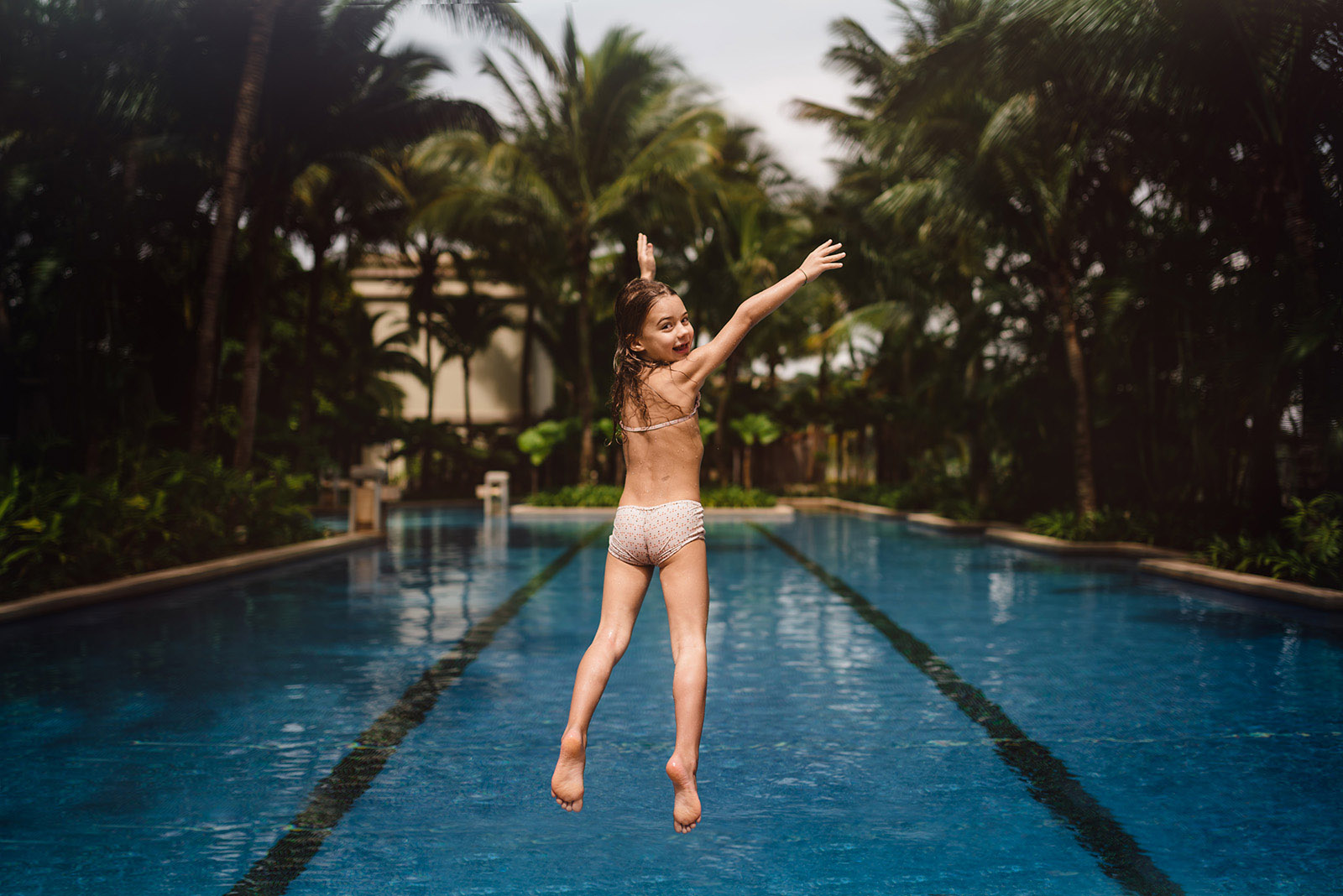 photo of girl jumping into a swimming pool by Anita Perminova The summer months offer up countless opportunities to infuse your lifestyle sessions — with clients or your own brood — with color, whimsy and pure joy. To help you plow this rich loam, we’re planting a few ideas, from the sublimely simple to the ridiculously complex. (Bonus: These’ll keep the kids occupied for a minute, too.)