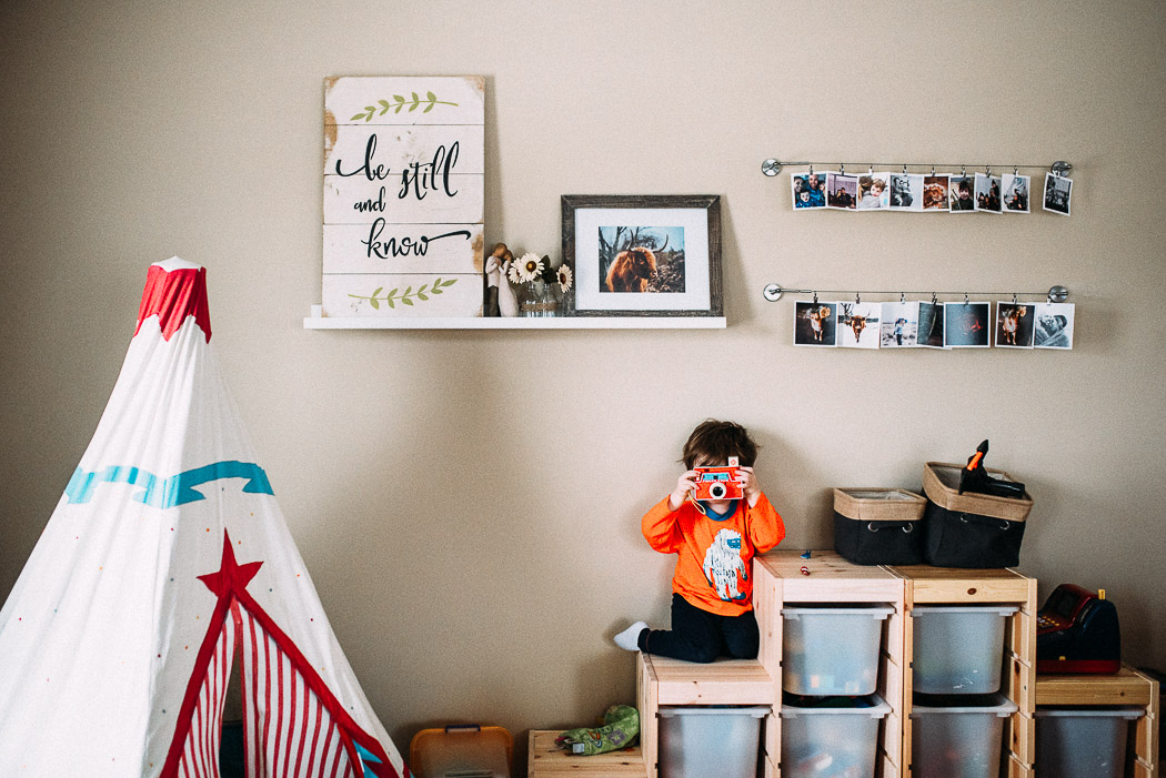 photo of kid taking a picture by Elise Meader