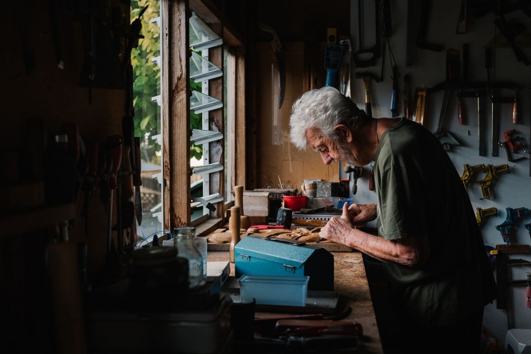 old man working in a workshop, a legacy contest winner