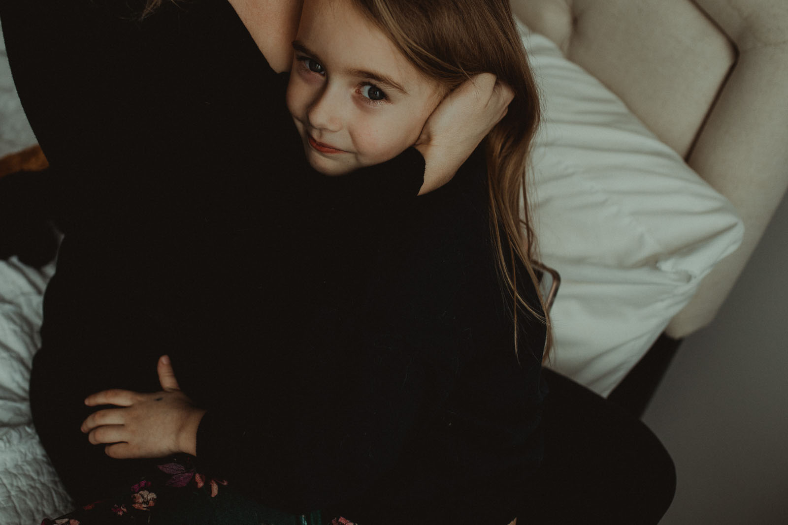 photographer-mom-laura-frazier-3 Mom hugging child. Finding balance with photography and motherhood