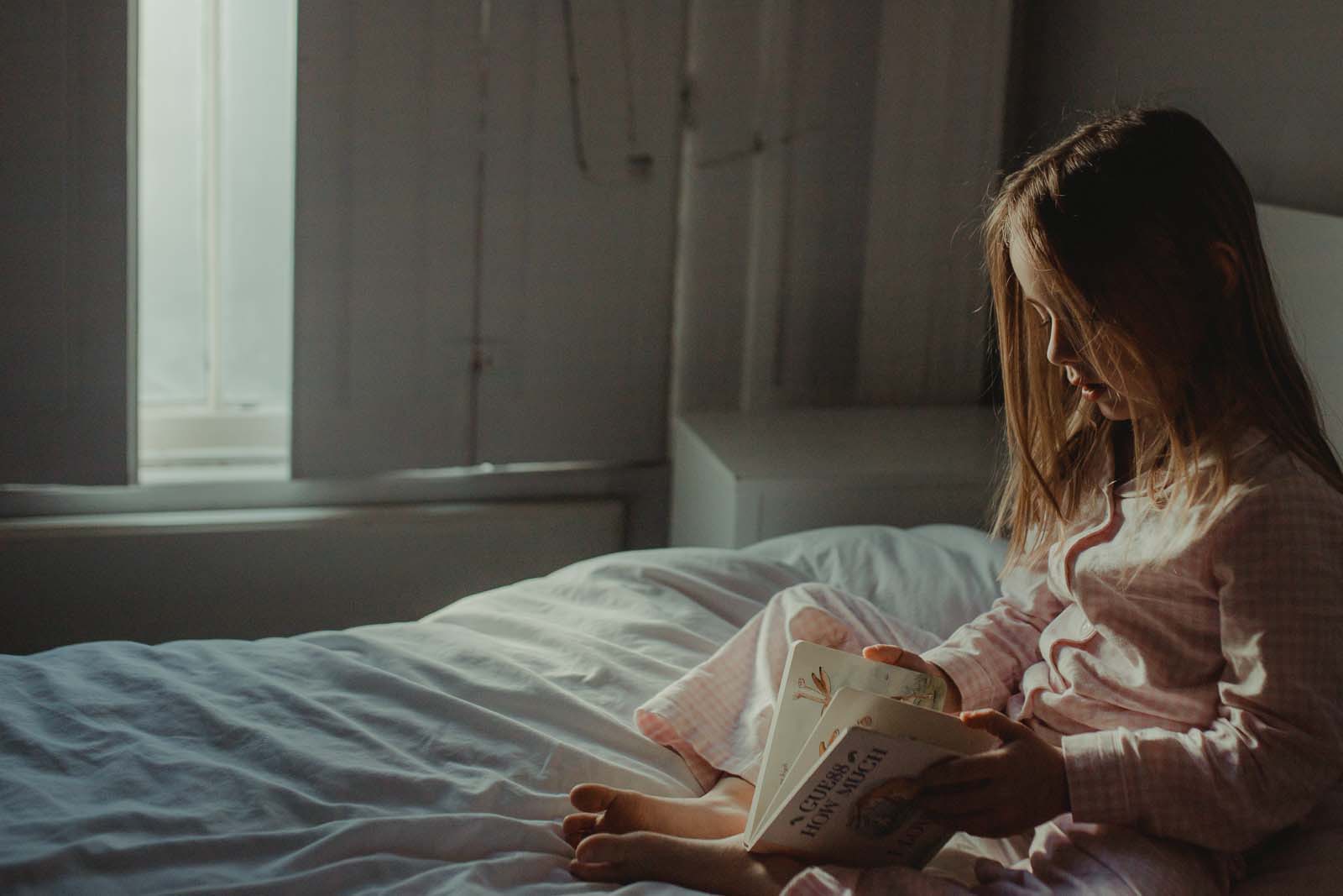 photographer-mom-laura-frazier-4 Girl reading. Finding balance with photography and motherhood