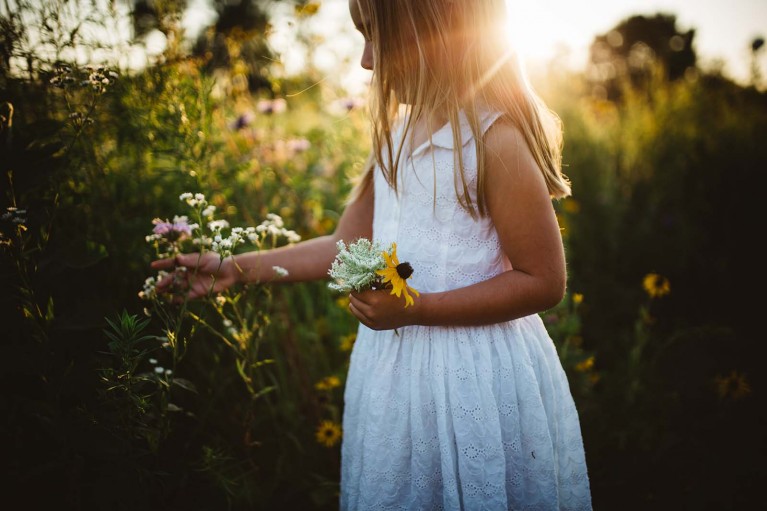 Girl picking flowers