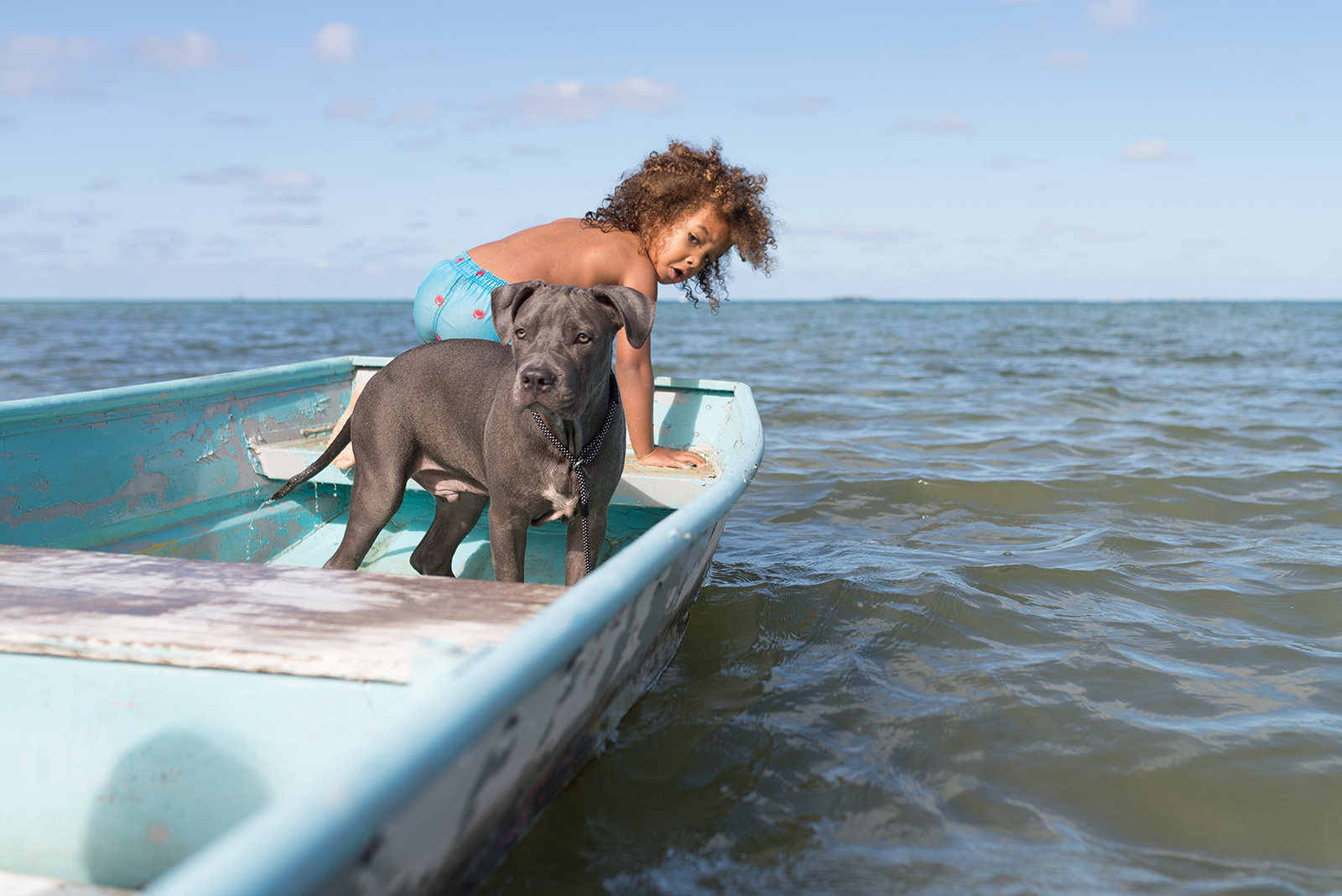 pic of kid and dog in a boat by Marian Diop The summer months offer up countless opportunities to infuse your lifestyle sessions — with clients or your own brood — with color, whimsy and pure joy. To help you plow this rich loam, we’re planting a few ideas, from the sublimely simple to the ridiculously complex. (Bonus: These’ll keep the kids occupied for a minute, too.)