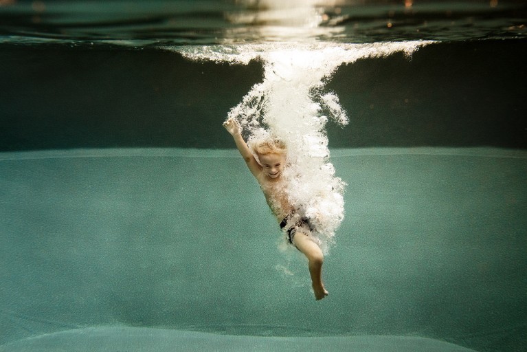Once I realized the powerful combination of water and light, my documentation of moments and faces began to become more artful interpretations.