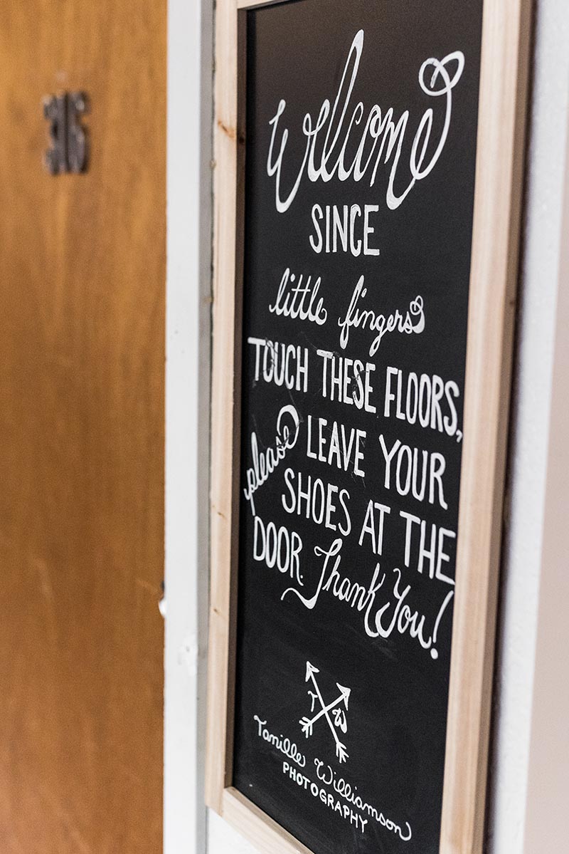 Tanille-Williamson-photo-studio-entry-sign Welcome sign in newborn studio