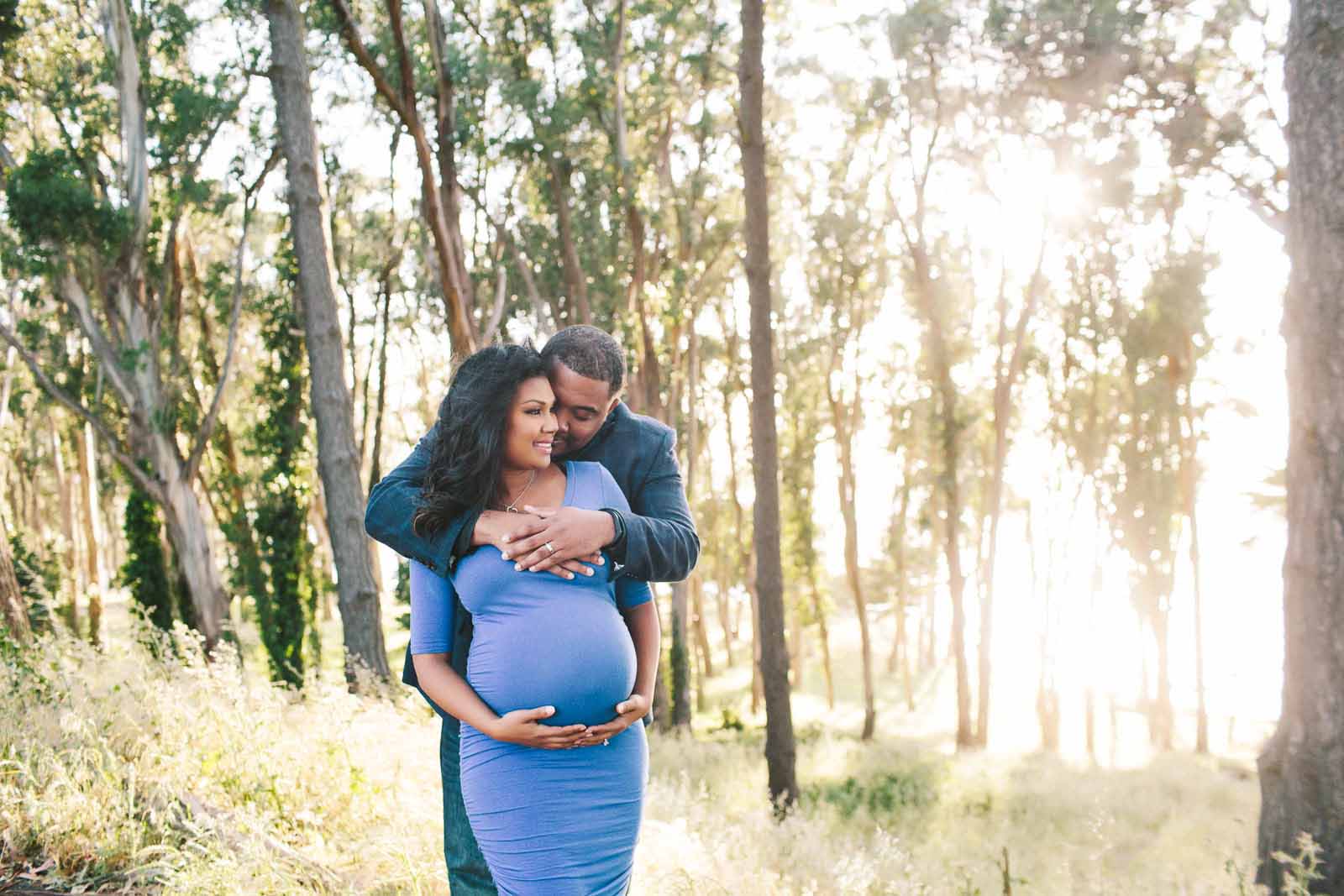 TarahPhotography-SanMateo-20miles Travel photo of a couple hugging in woods