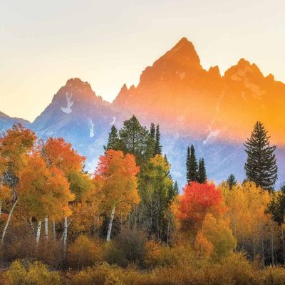 beautiful telephoto landscape photo with shadows and light on mountain