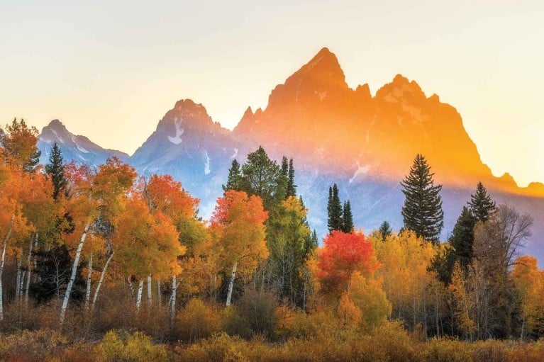 beautiful telephoto landscape photo with shadows and light on mountain