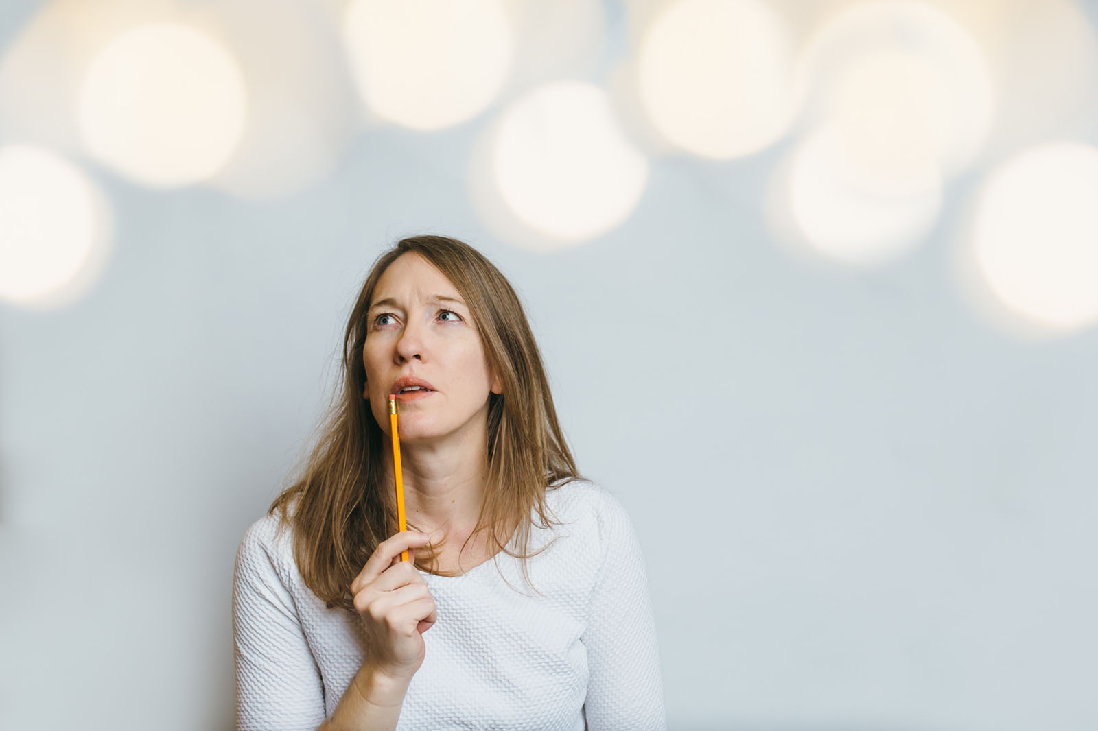 thinking about goals by Beth Ann Fricker Woman thinking about her photography goals for the year